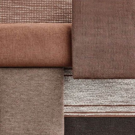 kompozycja próbek tkanin Sunbrella w ciepłej, ziemistej palecie kolorów, zdominowanej przez odcienie brązu (sable) i rdzy (rust)